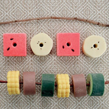 Load image into Gallery viewer, Yellow Door Sensory Play Stones - Threading Kebabs